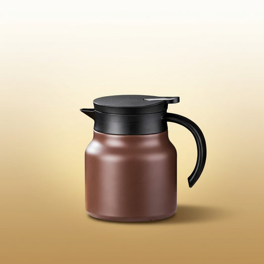 Tea Kettle on warm gold-sand background