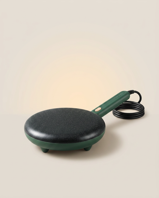 Electric Pancake and Crepe Maker on a warm ivory studio backdrop